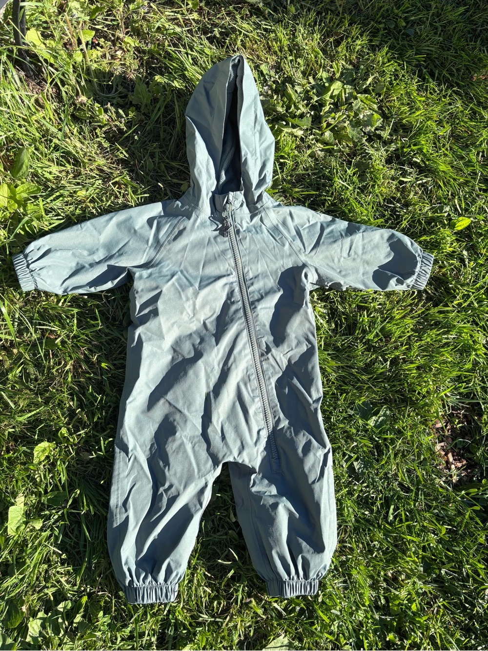 Green rain suit